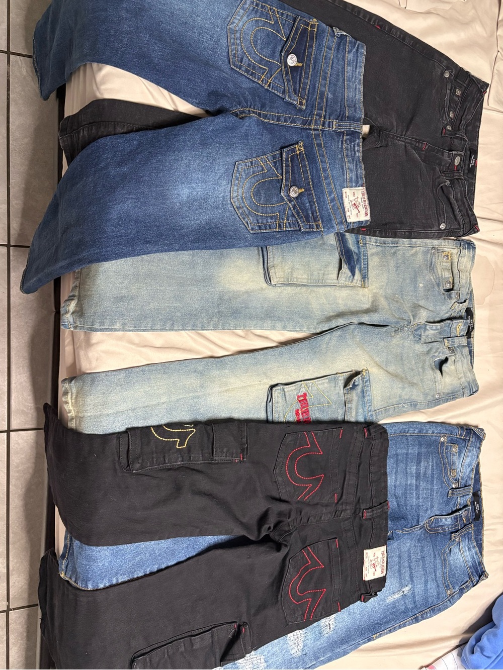 True Religion Kids Jeans in Blue, Light Wash, and Black